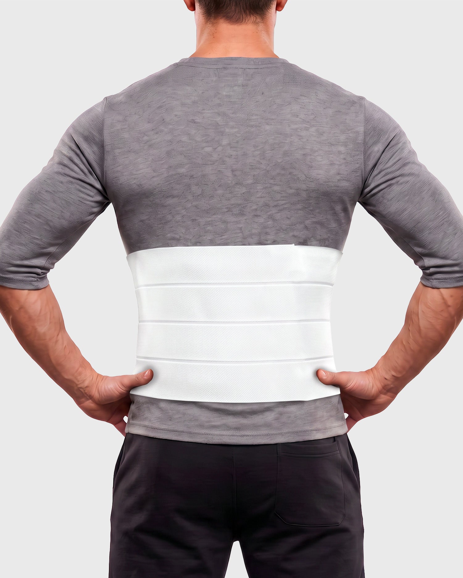 Frank Stubbs Universal 12-Inch Abdominal Binder on male model, rear view, showing full abdominal coverage and adjustable compression