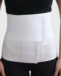 Contoured abdominal binder front view with adjustable compression support