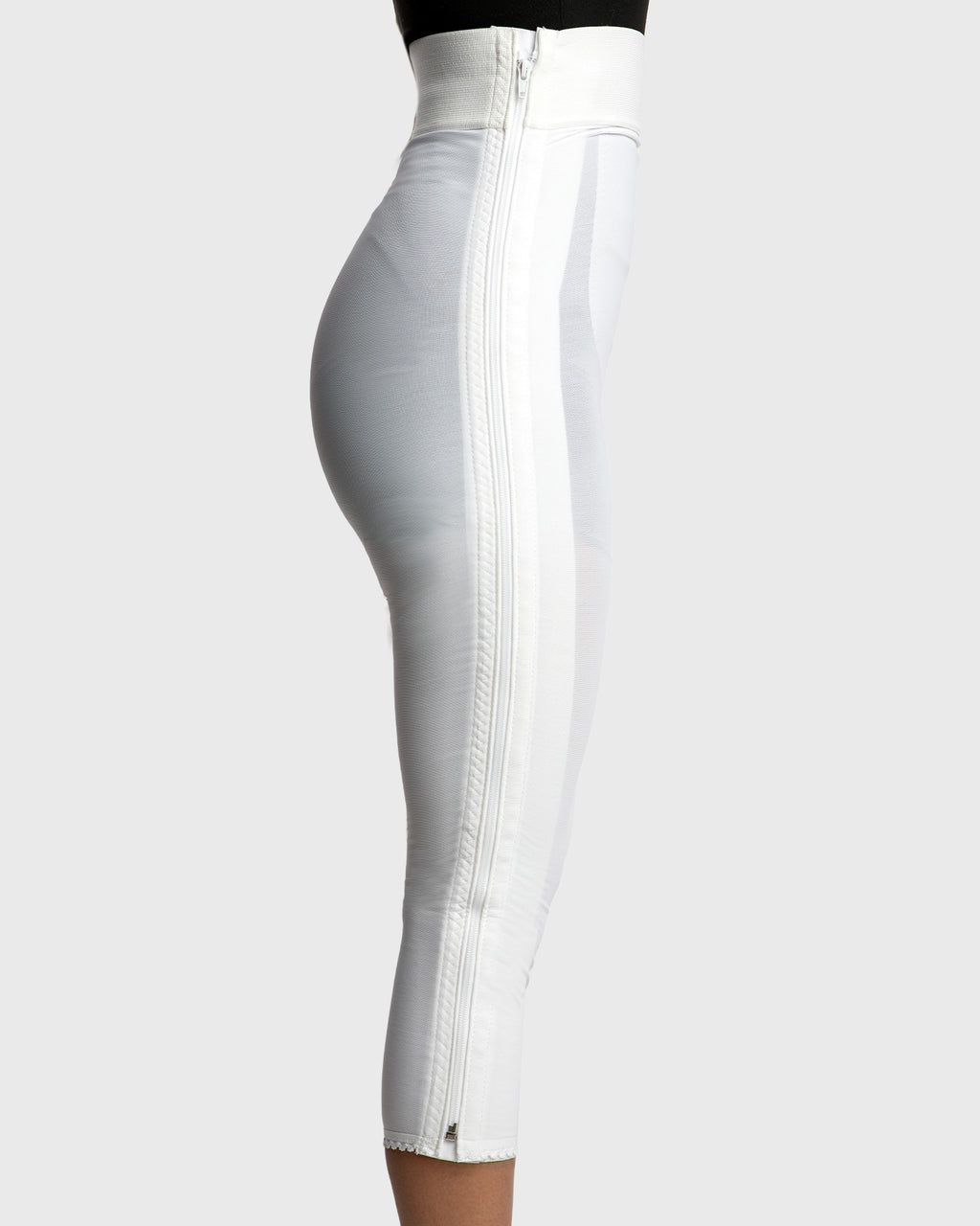 Side view of white high waist below knee compression girdle with hook and eye closure for extended compression