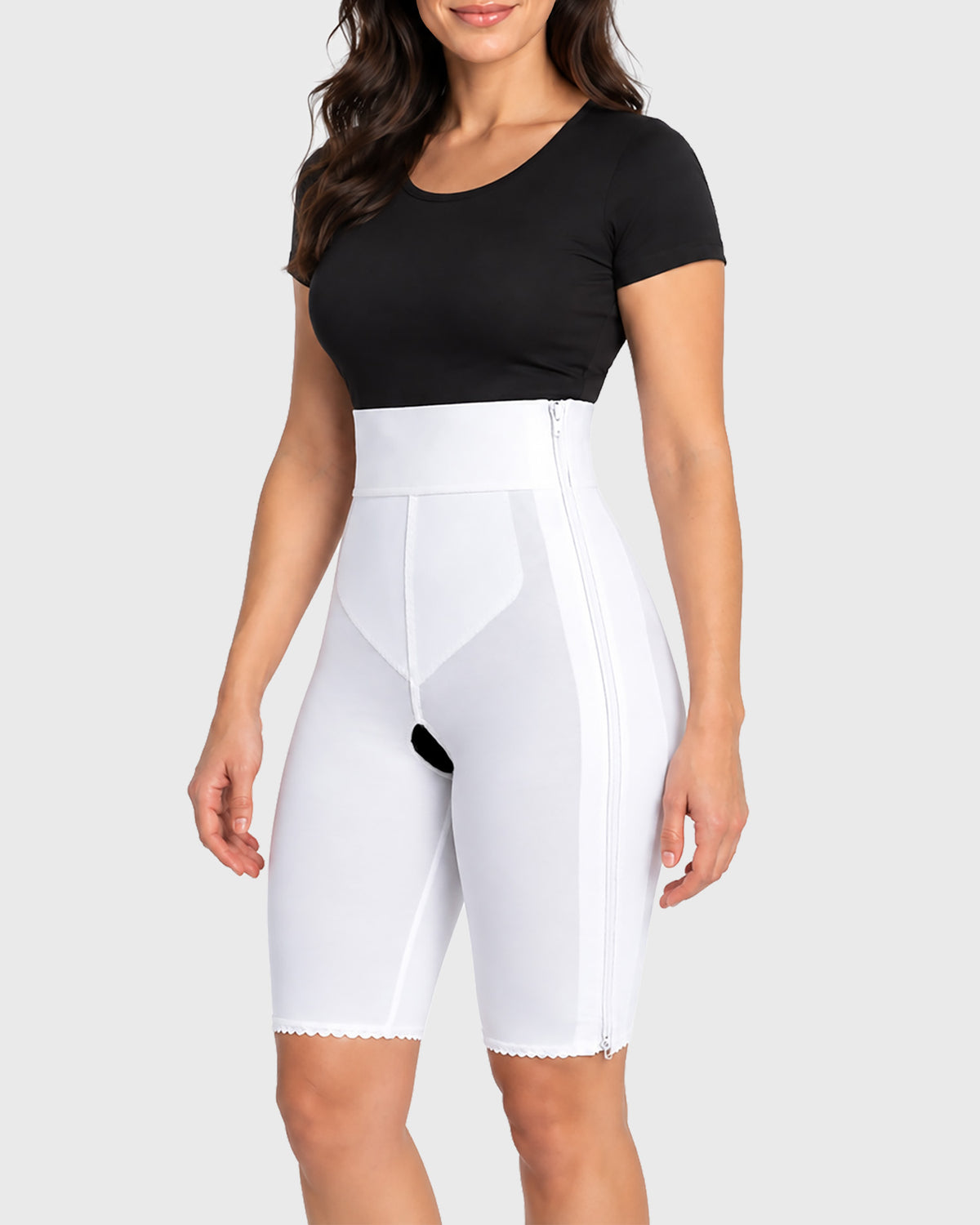 Front view of white high waist above knee compression girdle with hook and eye closure for post op recovery