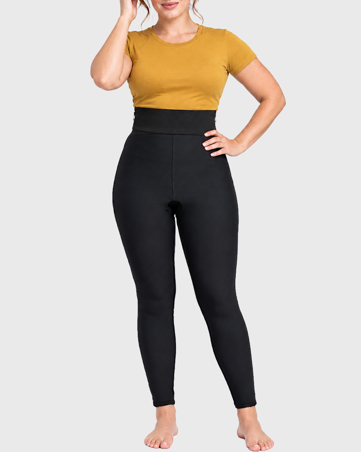 Front view of black high waist ankle length compression girdle with hook and eye closure and front zipper for post-surgical recovery