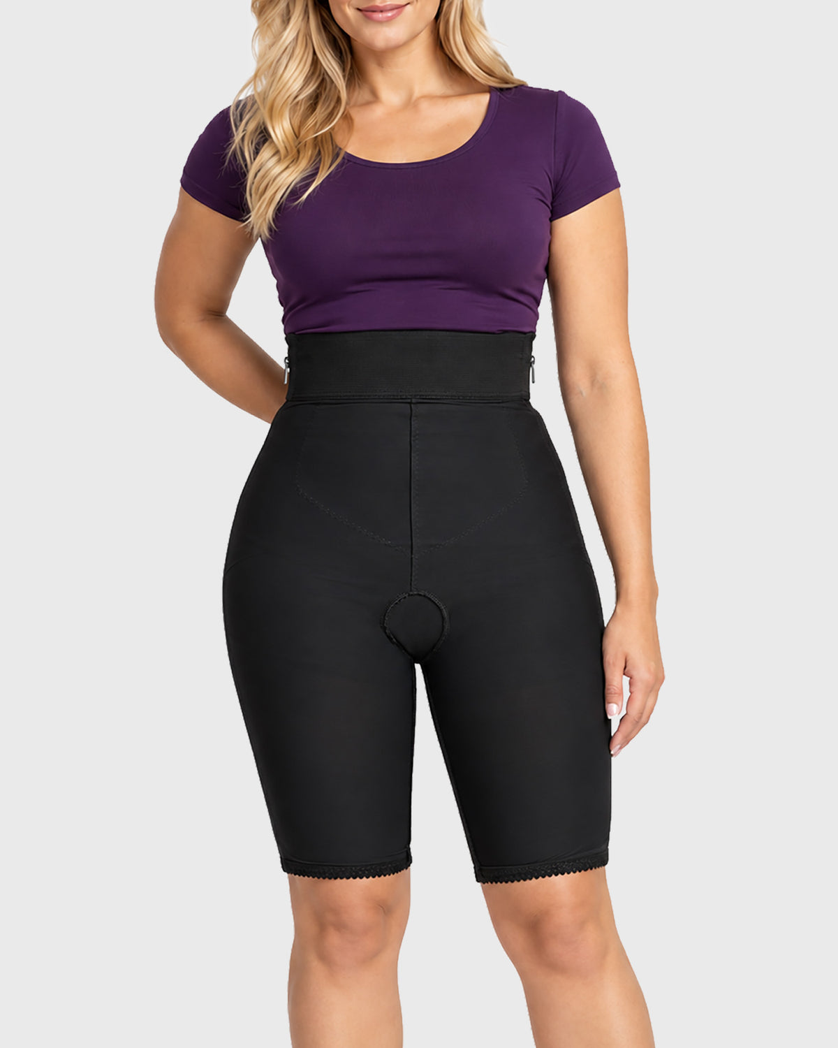 Front view of black high waist above knee compression girdle with hook and eye closure and front zipper for post-surgical recovery