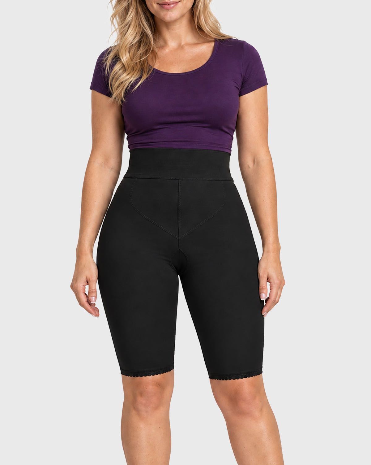 Front view of black above knee 2nd stage compression girdle for post-surgical recovery