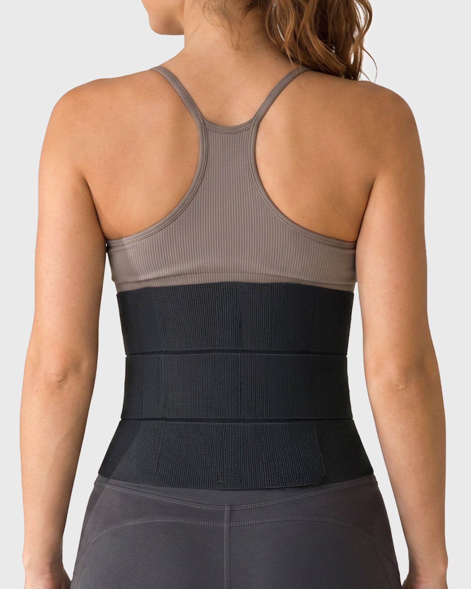 2.	Close-up of Frank Stubbs Universal 9" Abdominal Binder Black showing fabric texture and multi-panel design