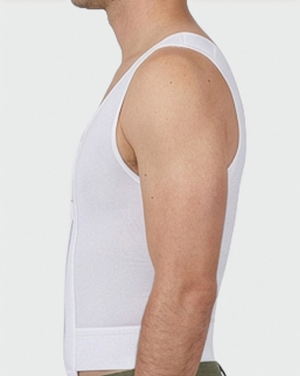 Side view of male compression vest showing contoured chest compression fit and adjustable closure
