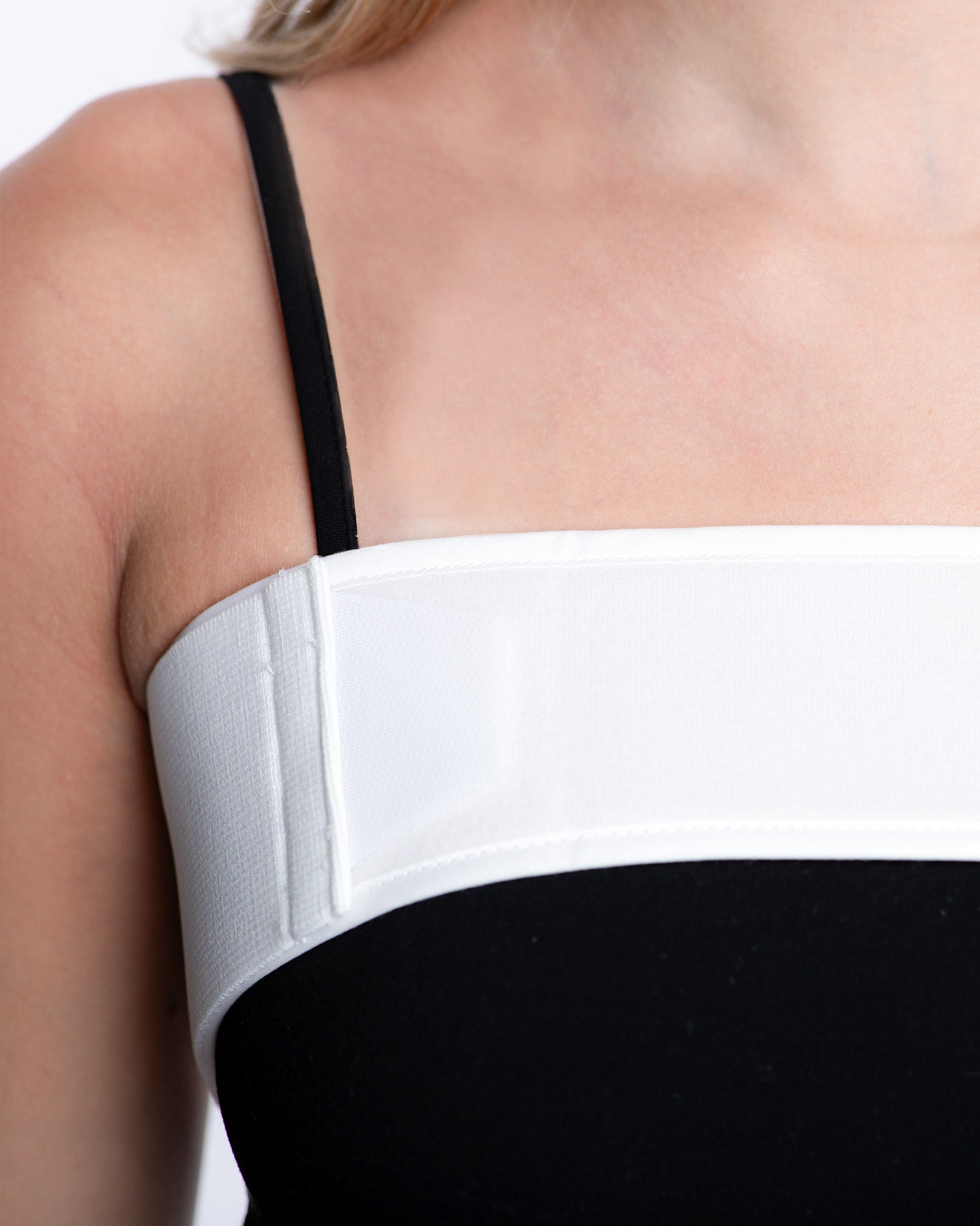 Close-up of adjustable breast augmentation wrap for post-surgical compression support