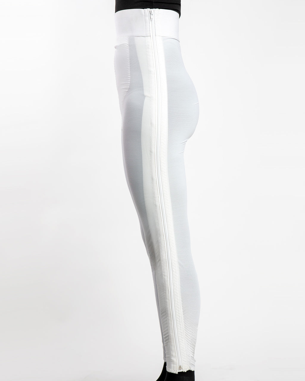 Side view of white high waist ankle length compression girdle with hook and eye closure for complete leg compression