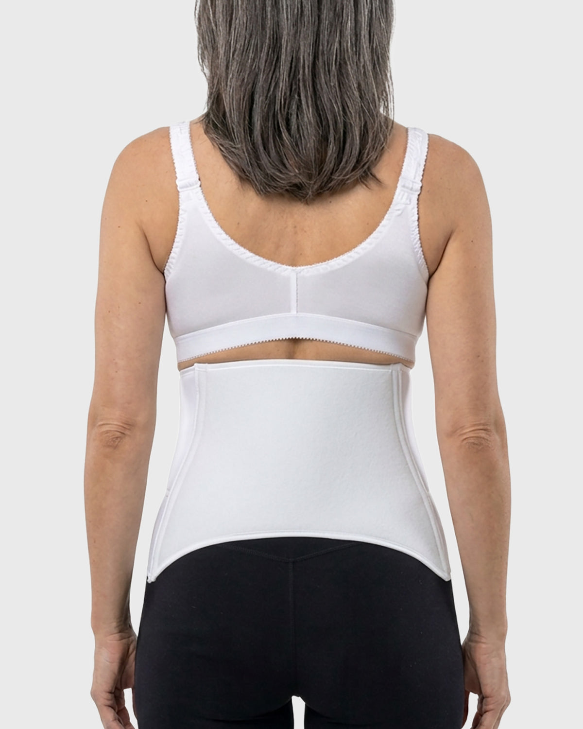 Back view of Frank Stubbs DIEP Flap Recovery Kit with white compression bra and contoured abdominal binder.
