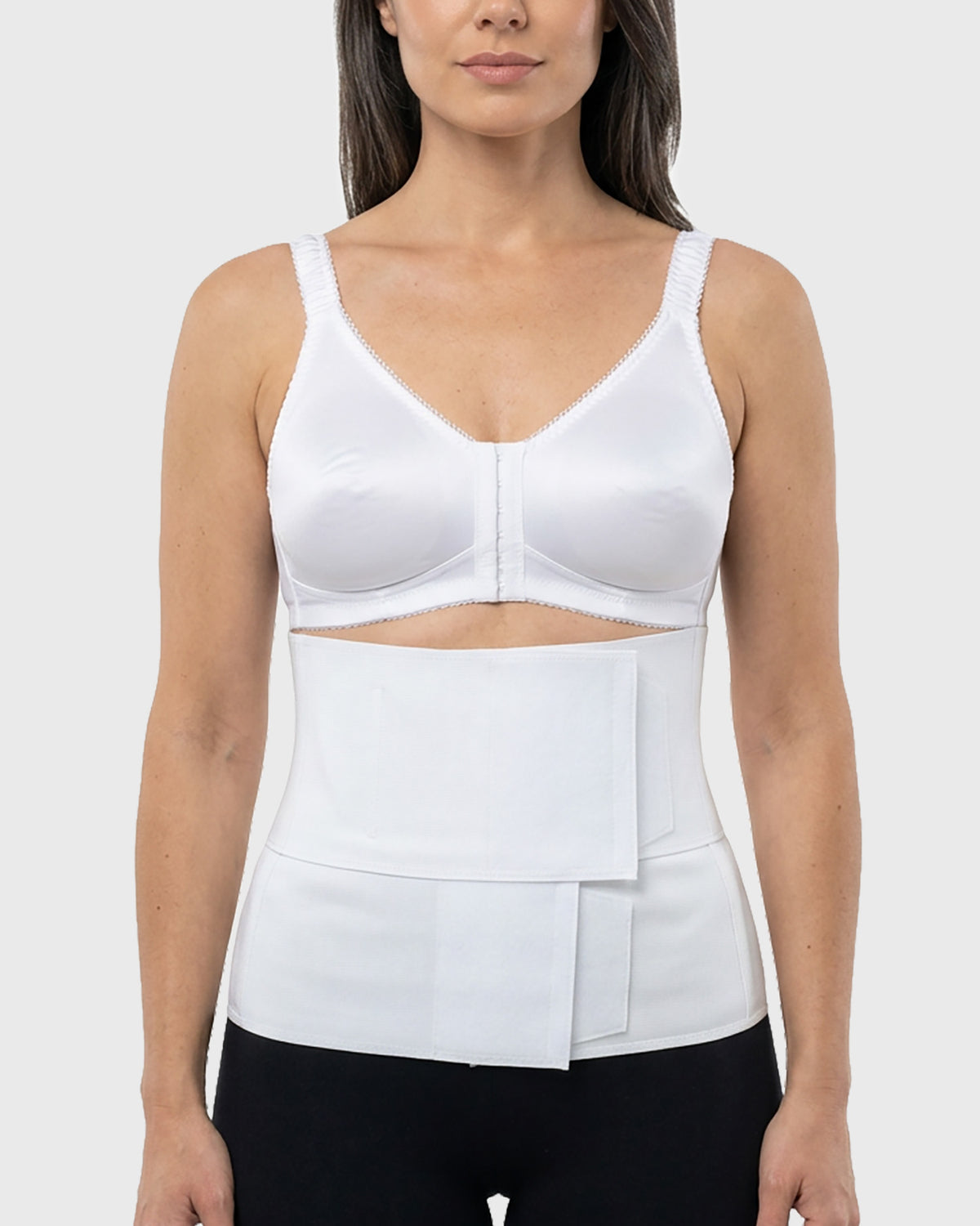 Front view of Frank Stubbs  DIEP Flap Recovery Kit with white compression bra and contoured abdominal binder.